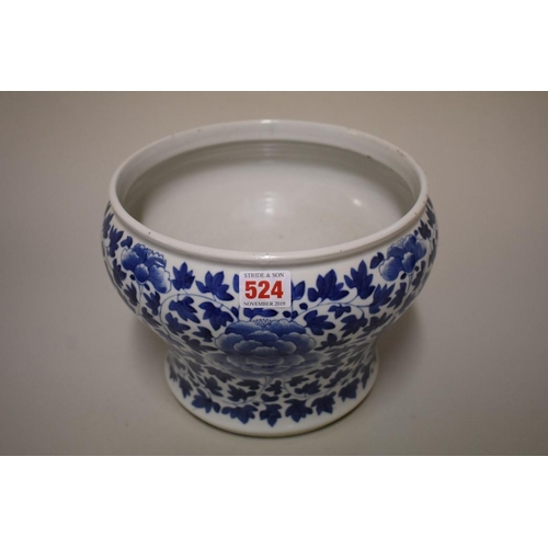 524 - A Chinese blue and white jar, late Qing, painted with peonies and scrolling foliage, 25cm diameter.... 