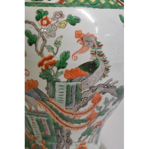 526 - A Chinese famille verte inverted baluster jar, 18th/19th century, painted with phoenix and flowering... 