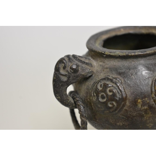 534 - An interesting and unusual Chinese Archaic twin handled dou or stem cup, relief decorated with styli... 