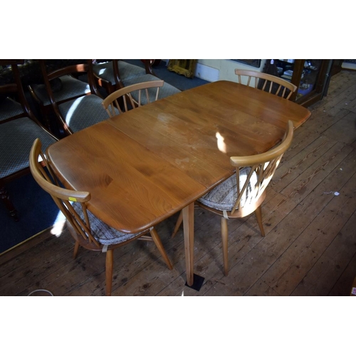 1413 - A vintage Ercol 'Blonde' elm drop leaf table and four chairs, 137cm wide.