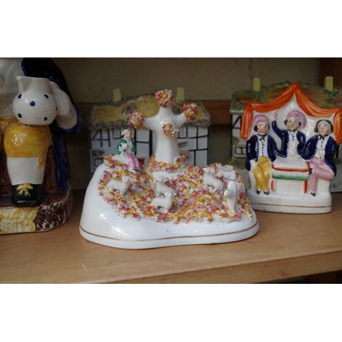 1012 - A mixed group of Victorian and later ceramics, to include: a Parian ware figure group, 24.5cm long, ... 