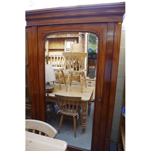 1028 - A Victorian mahogany mirror door single wardrobe, 132cm wide.