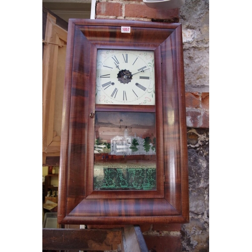 1057 - A 19th century American rosewood wall clock, by E.N Welch, 66cm high, with pendulum, (dial door crac... 