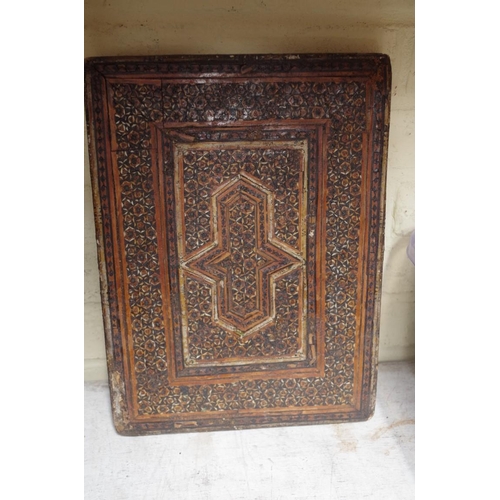 1102 - A Persian inlaid and polychrome decorated mirror, with a pair of hinged doors, 36 x 27cm; together w... 