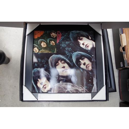 1114 - A small collection of Beatles memorabilia, to include: 33rpm albums; books; and a framed presen... 
