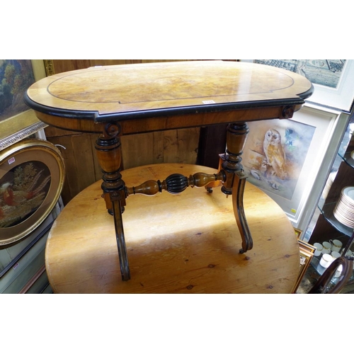 1124 - A late 19th century Continental walnut and ebonized centre table, 99cm wide.