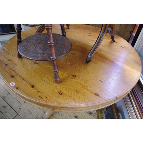 1126 - An old pine circular breakfast table, 122cm diameter. 