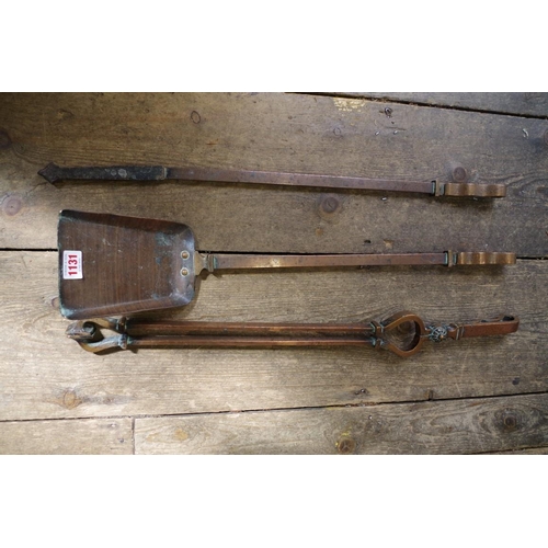 1131 - A set of three Arts & Crafts hammered copper fire irons. 