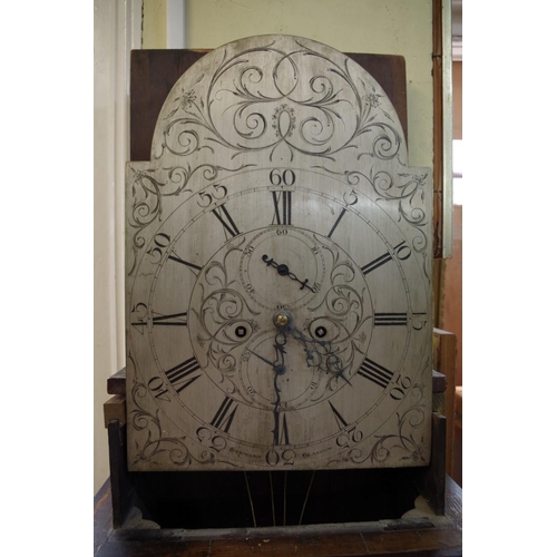 1132 - An early 19th century Scottish mahogany eight day longcase clock, the 13in silvered arched dial insc... 