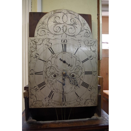 1132 - An early 19th century Scottish mahogany eight day longcase clock, the 13in silvered arched dial insc... 