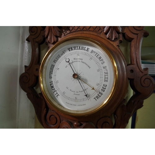 1177 - An antique French carved beech aneroid wheel barometer, 69cm high. 