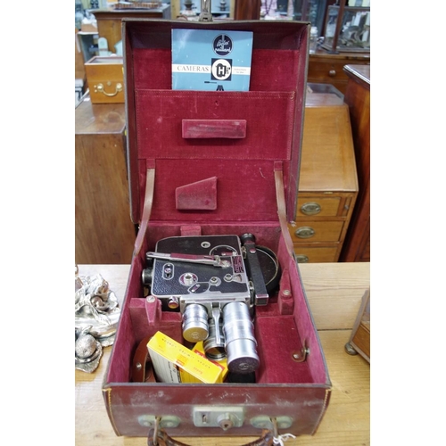 1213 - A Paillard Bolex 16mm movie camera, serial no.72312, in fitted case with instruction manual.... 