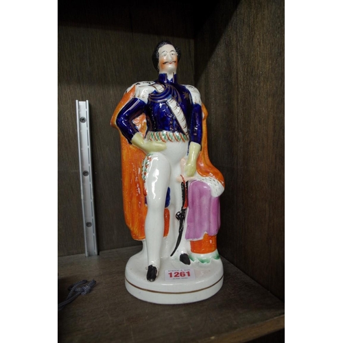 1261 - A Victorian Staffordshire pottery figure of Prince Albert, 27.5cm high.