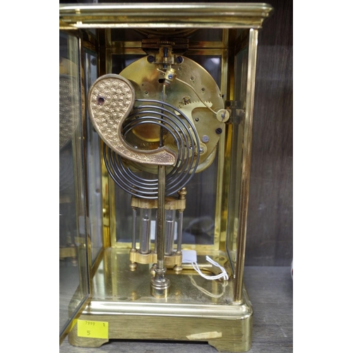 1263 - An Ansonia brass four glass mantel clock, with exposed escapement and mercury pendulum, 27.5cm high,... 