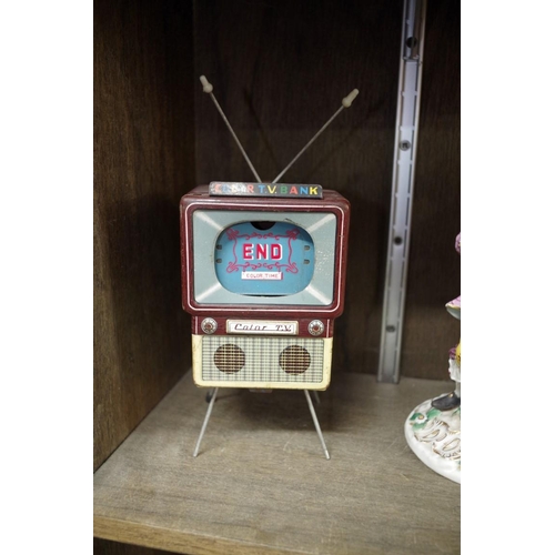 1266 - A rare 1950s Haji 'Made in Japan' tin plate novelty musical 'Color TV Bank', 23.5cm high.... 