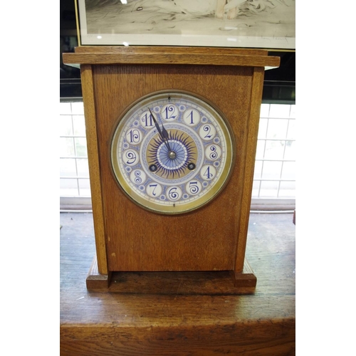 1345 - A late 19th century Aesthetic oak mantel clock, attributed to Lewis Foreman Day, with painted 6... 