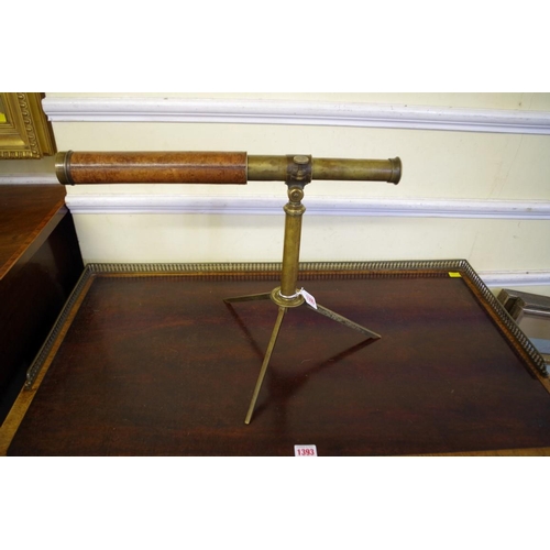 1395 - An antique leather and brass two drawer telescope, by 'Watkins & Hill, Charing Cross', 60.5cm ex... 