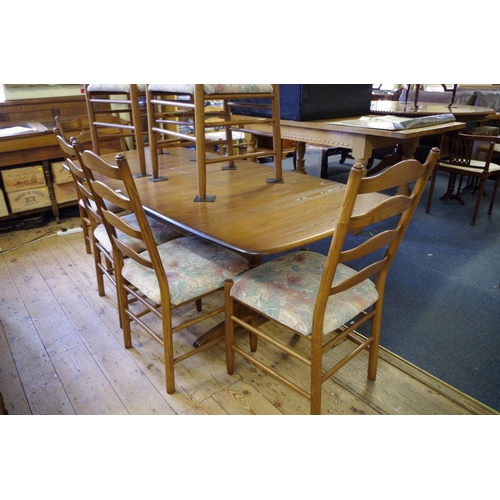 1408 - An Ercol 'Golden Dawn' dining table and chairs, comprising a drawleaf table, 203cm extended; and eig... 