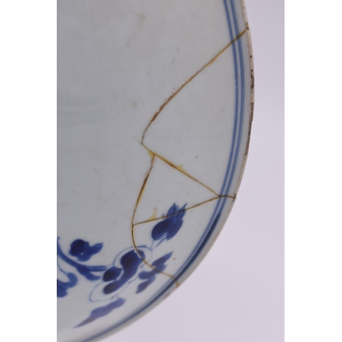 600 - A Chinese blue and white dish, Chenghua six character mark to base, painted with flowers, 34cm diame... 