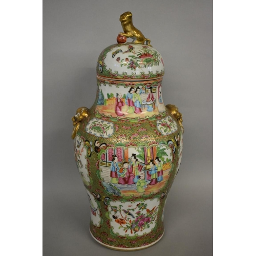 618 - A Chinese famille rose twin handled vase and cover, 19th century, 44.5cm high; together with another... 