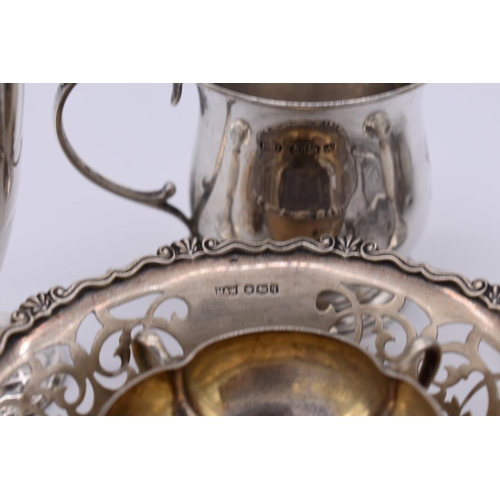 334 - A quantity of hallmarked silver, to include: two bonbon dishes; and two silver Christening mugs, 500... 