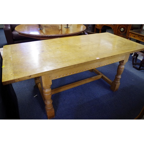 1406 - A good oak refectory type table, by Heal's, 183cm long.