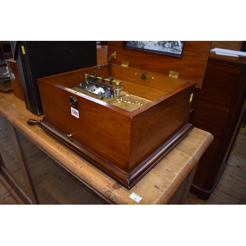 1209 - A Polyphon walnut and inlaid music box, playing 11in discs, the mechanism numbered 191, 40.5cm wide,... 