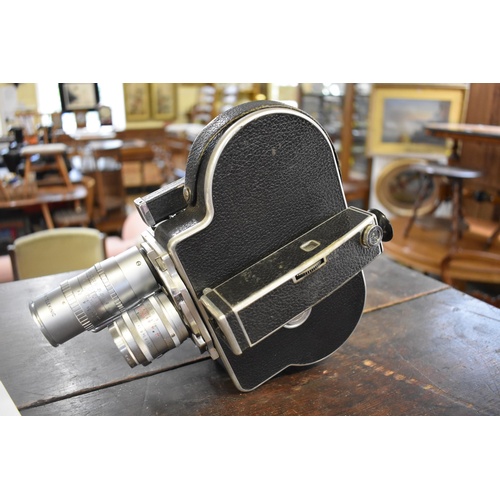 1213 - A Paillard Bolex 16mm movie camera, serial no.72312, in fitted case with instruction manual.... 