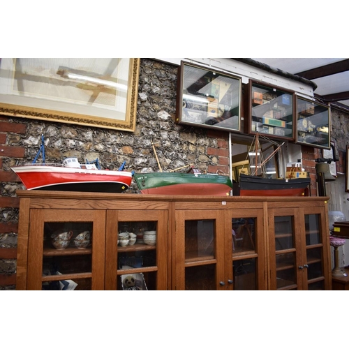 1158 - Three modern painted wood model fishing boats, largest hull 90cm. 