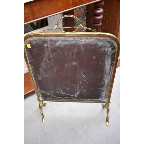 1164 - A brass and mirrored glass fire screen, 47.5cm wide.