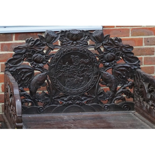 1686 - A large pair of Chinese carved and pierced hardwood Imperial throne chairs and matching table, proba... 