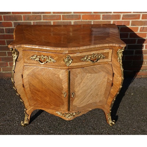 1446 - A Louis XV satinwood, kingwood and rosewood bombe commode, with gilt metal mounts, 97cm wide.... 