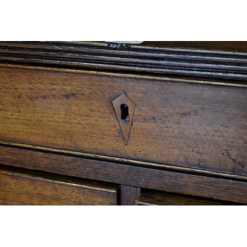 1001 - A George III oak chest of drawers, 108cm wide x 48cm deep x 109cm high.