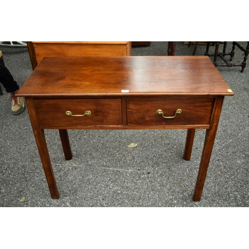 1008 - A mahogany two drawer side table, 97cm wide x 46cm deep x 76cm high.
