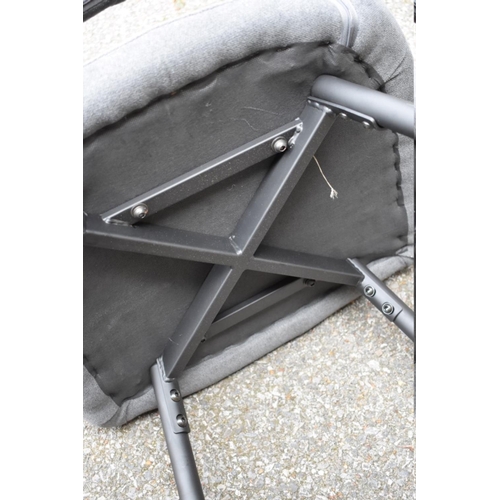 1009 - A grey upholstered bar stool; together with two other metal bar stools. 