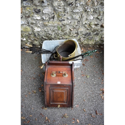 1022 - A mahogany coal scuttle; together with a set of fire irons and one other coal scuttle. 