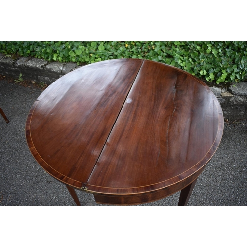 1030a - A George III mahogany, inlaid and crossbanded demi lune table.