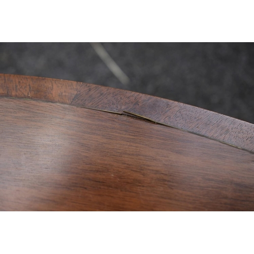 1032 - A reproduction mahogany and brass strung circular table, 100cm diameter.