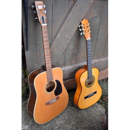 1033 - A Yasuma Jumbo 155 acoustic guitar; together with another acoustic guitar. 