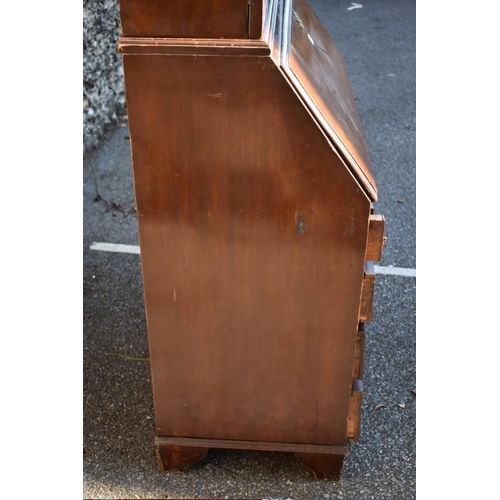 1034 - An Edwardian mahogany inlaid bureau bookcase, 91cm wide. 