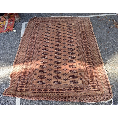 1079 - A Bokhara rug, with geometric borders, 180 x 127cm. 