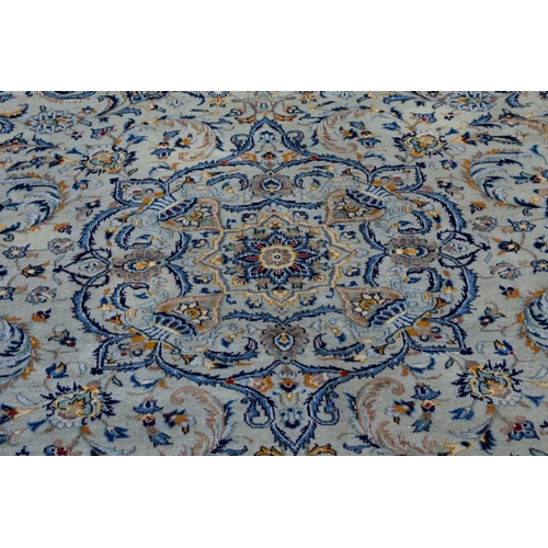 1108 - A large Persian carpet, having central floral medallion, with floral borders, 392 x 302cm.... 