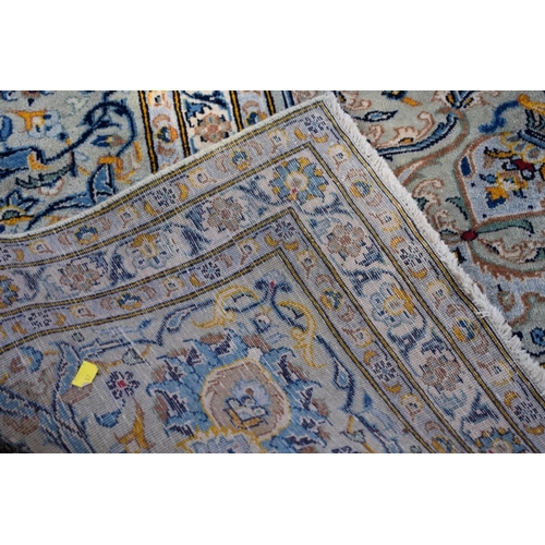 1108 - A large Persian carpet, having central floral medallion, with floral borders, 392 x 302cm.... 