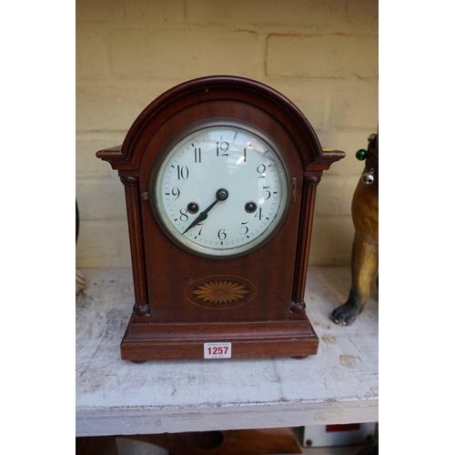 1257 - An Edwardian mahogany and inlaid mantel clock, 31cm high. 