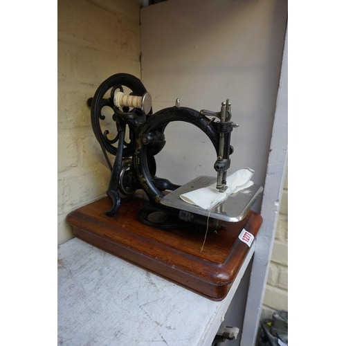 1277 - A Willcox & Gibbs sewing machine. 