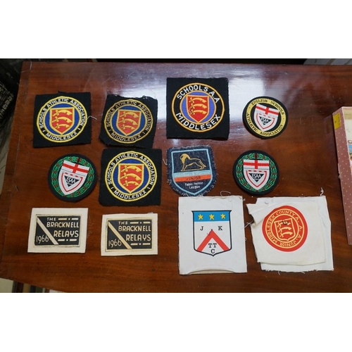 1360 - A small collection of sporting and related badges. 