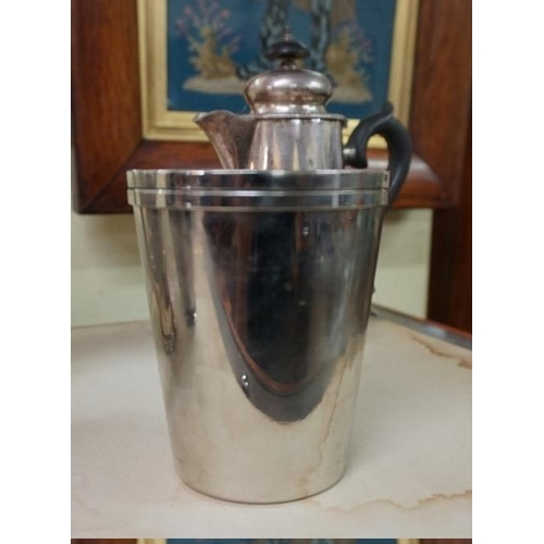 1396 - A silver mounted desk blotter, 48.5cm wide; together with an electroplated three piece teaset, ... 