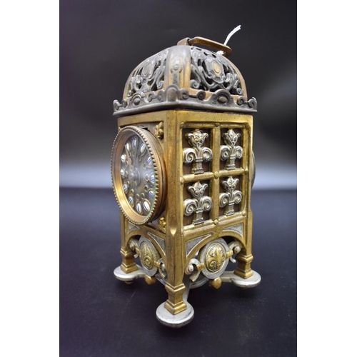 1505 - An unusual late 19th/early 20th century brass and plated metal clock garniture, height of clock... 