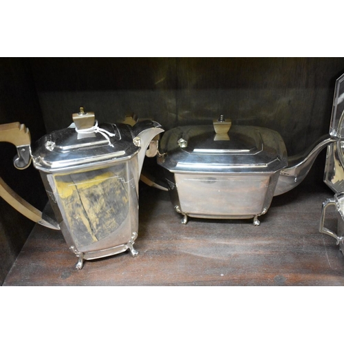 1520 - An Art Deco electroplated four piece teaset; together with a similar sandwich plate.... 