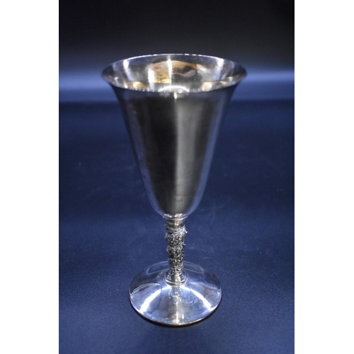 1576 - A set of twenty-two electroplated wine goblets; together with a novelty sugar scuttle and spoon... 